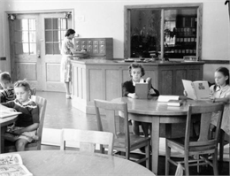 Children reading in library