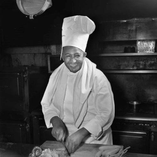 Chef Carson Gulley, University of Wisconsin-Madison residence hall chef, chopping vegetables.